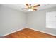 Cozy bedroom with hardwood floors and a ceiling fan at 133 Harold Dr, Mcdonough, GA 30253