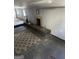 Unfinished basement featuring a fireplace and vintage rug at 360 Meadowbrook Dr, Mcdonough, GA 30253