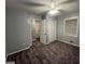 Cozy bedroom with plush carpet, neutral walls, a ceiling fan, and a window with blinds at 360 Meadowbrook Dr, Mcdonough, GA 30253
