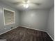 Bedroom with carpet, a window for natural light, and neutral wall color at 360 Meadowbrook Dr, Mcdonough, GA 30253
