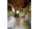 Interior view showing deteriorated cinder block walls, paint, and debris at 360 Meadowbrook Dr, Mcdonough, GA 30253