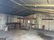 Interior view of metal building with wooden work benches at 360 Meadowbrook Dr, Mcdonough, GA 30253