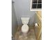 Toilet area with neutral walls and tile floors. Features a window for natural light at 360 Meadowbrook Dr, Mcdonough, GA 30253