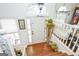 Bright foyer with hardwood floors, staircase, and ample natural light at 3435 Pierce Arrow Cir, Suwanee, GA 30024