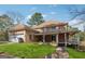 Lovely home with a large garage, expansive lawn, and covered porch perfect for outdoor living at 2200 Gleneagle Nw Ct, Conyers, GA 30012