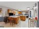 Spacious kitchen with a center island, wood cabinets, modern appliances, and abundant counter space at 2200 Gleneagle Nw Ct, Conyers, GA 30012