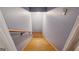 A wooden staircase leading to the basement with freshly painted walls at 2200 Gleneagle Nw Ct, Conyers, GA 30012