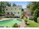 Spacious backyard with a refreshing pool, multiple decks, and plenty of green space at 2612 New Haven Dr, Jonesboro, GA 30236