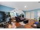 Expansive bedroom with hardwood floors, blue painted walls and ample space at 2612 New Haven Dr, Jonesboro, GA 30236