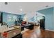 Large bedroom offering hardwood floors, dormer windows, and blue painted walls at 2612 New Haven Dr, Jonesboro, GA 30236