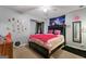 Cozy bedroom with eclectic decor, a statement bed, and a mix of textures for added comfort at 2612 New Haven Dr, Jonesboro, GA 30236