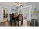 Charming breakfast nook with natural light, wood floors, and a view of the outdoors at 2612 New Haven Dr, Jonesboro, GA 30236