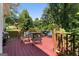Inviting deck with comfortable seating, perfect for enjoying the lush, tree-lined backyard at 2612 New Haven Dr, Jonesboro, GA 30236
