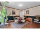 Dining room features classic hardwood floors and decorative moldings, offering a cozy space for gatherings at 2612 New Haven Dr, Jonesboro, GA 30236
