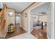 Hallway featuring beautiful tile work and natural light, which enhances the transitional space at 2612 New Haven Dr, Jonesboro, GA 30236