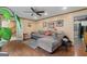 Inviting living room featuring hardwood floors, ceiling fan, and a comfortable sectional sofa at 2612 New Haven Dr, Jonesboro, GA 30236