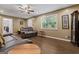 Cozy living room showcasing hardwood floors and a leather sofa set, ideal for casual lounging and entertaining at 2612 New Haven Dr, Jonesboro, GA 30236