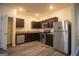 Stylish kitchen offers stainless appliances, granite countertops and hardwood flooring at 6342 Kinsland Ct, Lithonia, GA 30058