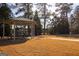 Community pavilion with picnic tables on grass at 6342 Kinsland Ct, Lithonia, GA 30058