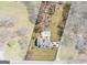 Aerial view of a home featuring a private pool, patio, and mature landscaping in a rural setting at 8 Cameron St, Moreland, GA 30259