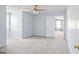 Spacious bedroom featuring neutral walls, carpeted floors, and a ceiling fan for comfort at 8 Cameron St, Moreland, GA 30259