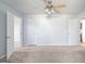 Bright bedroom boasting neutral walls, carpeted floors, and ample natural light from the windows at 8 Cameron St, Moreland, GA 30259