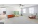 Bonus room featuring carpet floors and natural light from the windows at 8 Cameron St, Moreland, GA 30259