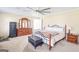 Large main bedroom features a ceiling fan, carpet floors, and nice furniture at 8 Cameron St, Moreland, GA 30259