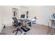 Bedroom features black desk, printer and an ironing board at 2441 Noelle Ln, Powder Springs, GA 30127