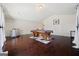 Spacious game room featuring a pool table, bar, and rich hardwood flooring perfect for entertaining at 2441 Noelle Ln, Powder Springs, GA 30127