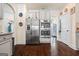 Modern kitchen with stainless steel appliances, granite countertops, and white cabinets at 2441 Noelle Ln, Powder Springs, GA 30127