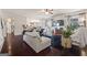 Spacious living room with hardwood floors, fireplace, and an open floor plan at 2441 Noelle Ln, Powder Springs, GA 30127