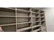 Custom closet with lots of shelving, ready for organizing your wardrobe at 336 Traditions Ln # 147, Hampton, GA 30228
