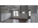 Dining room with coffered ceiling, chandelier, and natural light at 336 Traditions Ln # 147, Hampton, GA 30228