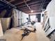 Unfinished basement space with weights, and workout equipment at 4436 Old Country Way, Snellville, GA 30039