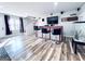 Finished basement with a bar, tv, unique flooring and a aquarium at 4436 Old Country Way, Snellville, GA 30039