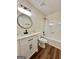 Bathroom featuring shower-tub combination with modern sink and black fixtures at 3280 Gum Creek Rd, Oxford, GA 30054