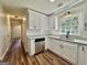 Modern kitchen with stainless appliances, granite counters and white cabinets at 3280 Gum Creek Rd, Oxford, GA 30054