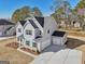 Aerial view of home featuring driveway and two-car garage at 3725 Heron Creek Ct, Loganville, GA 30052