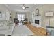 Inviting living room features hardwood floors, a decorative fireplace, and comfortable seating at 208 Pinnacle Ct, Peachtree City, GA 30269