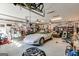 Spacious garage interior with a sports car, storage solutions, and ample workspace at 305 Cranmore Pl, Villa Rica, GA 30180