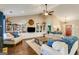 Spacious living room featuring hardwood floors, built-in shelving, and comfortable seating at 305 Cranmore Pl, Villa Rica, GA 30180