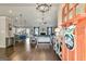 View of a beautifully designed living space, connecting kitchen and dining areas with stylish decor at 305 Cranmore Pl, Villa Rica, GA 30180
