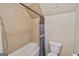 Bathroom featuring a tub and shower combination with a curtain at 5997 Wildcreek Rd, Sugar Hill, GA 30518
