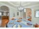 Formal dining room with modern chandelier and easy access to living areas at 5997 Wildcreek Rd, Sugar Hill, GA 30518