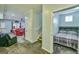 Hallway view leading to a bedroom, showcasing a glimpse of cozy living spaces and functional design at 5997 Wildcreek Rd, Sugar Hill, GA 30518