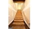 Unfinished wooden stairs leading to the basement, offering a blank canvas for customization at 209 East Wilson St # 25, Villa Rica, GA 30180