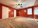 Spacious bedroom with carpet flooring, ceiling fan and a window, offering a cozy retreat at 209 East Wilson St # 25, Villa Rica, GA 30180