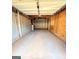 Unfinished garage with concrete flooring, exposed wood framing, and concrete walls at 209 East Wilson St # 25, Villa Rica, GA 30180