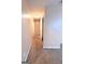 Hallway with carpet flooring, neutral colored walls, and access to other rooms at 209 East Wilson St # 25, Villa Rica, GA 30180